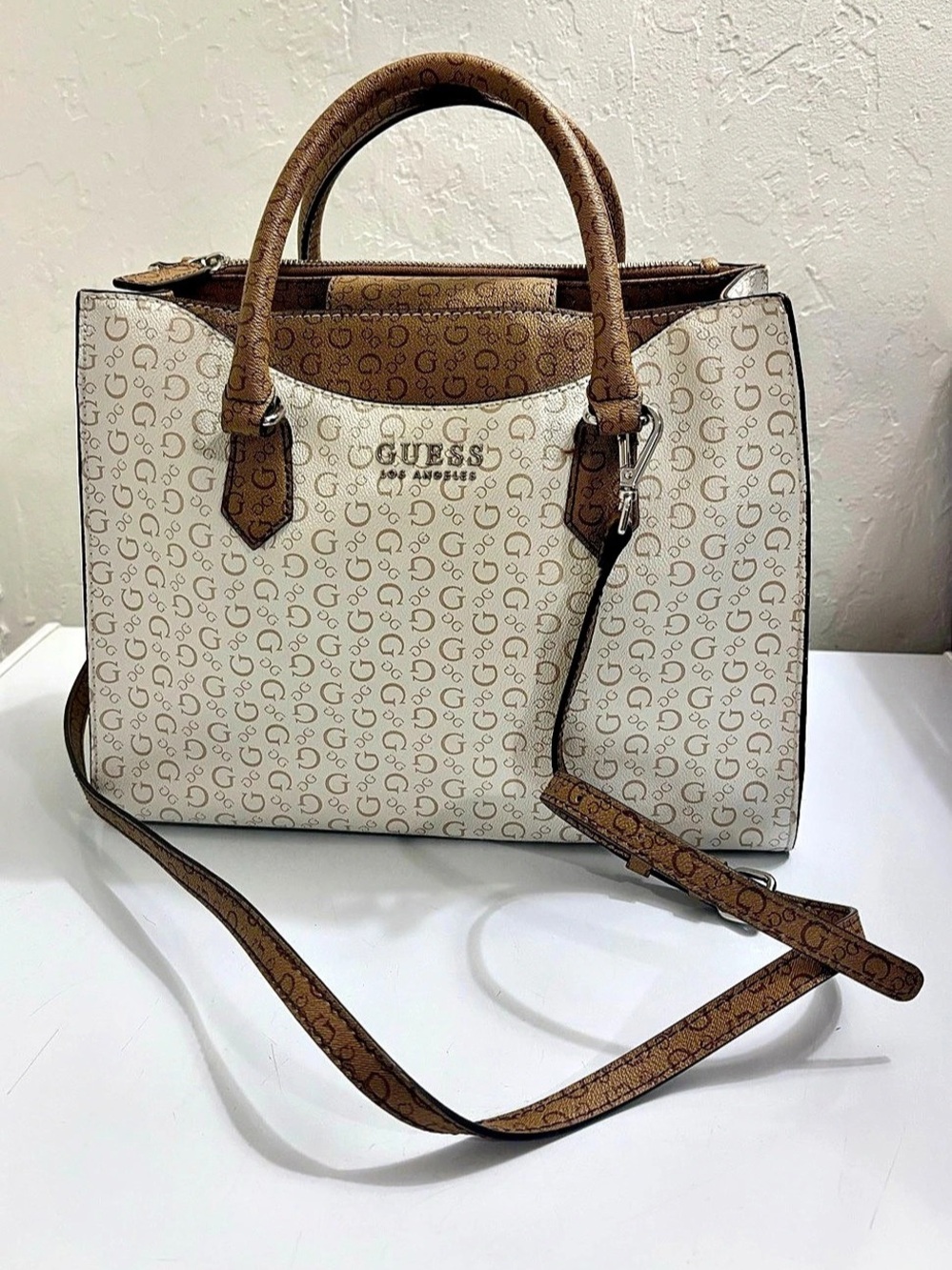 GUESS Logo Print Shoulder Bag in White & Brown